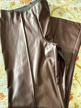 a new day Black and Brown Labeled Garment